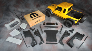 Illustration for article titled Jeep Wrangler pickup kit revives American manliness for just $5,499